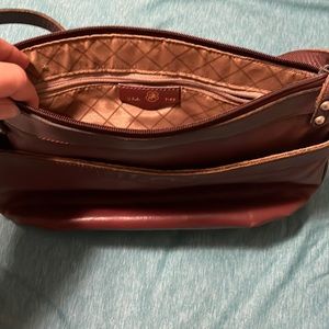 John Romain handbag.